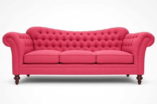 Lux & Borough Antoinette style tufted chesterfield sofa in vibrant pink fabric with turned wooden legs.