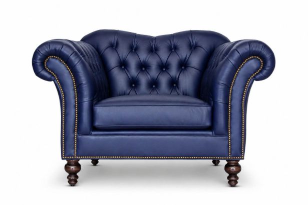 Lux and Borough Antoinette style custom accent chair featuring an undulating, contoured backrest with deep button tufting and exquisitely detailed turned dark wood legs.