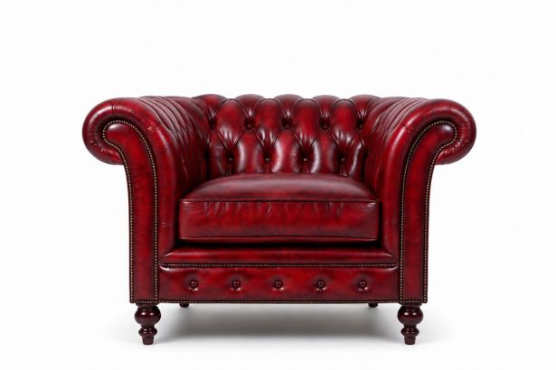 Lux and Borough Windsor style custom armchair featuring a deeply button-tufted backrest, timeless rolled arms accented with polished metal nailhead trim, and a clean, tailored base.