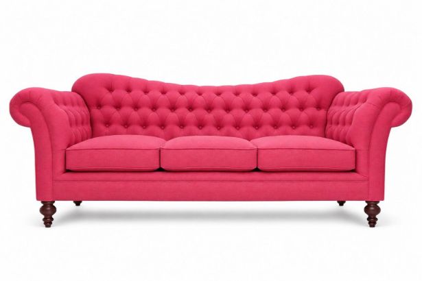 Lux & Borough Antoinette style tufted chesterfield sofa in vibrant pink fabric with turned wooden legs.