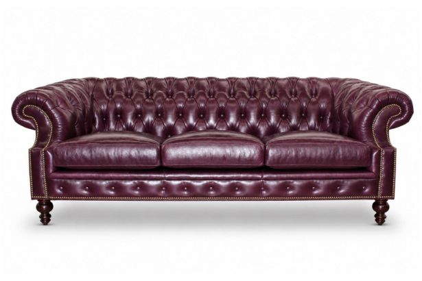 Lux & Borough Orleans style leather tuxedo sofa in warm brown leather featuring deep vertical channel tufting and a low profile base.